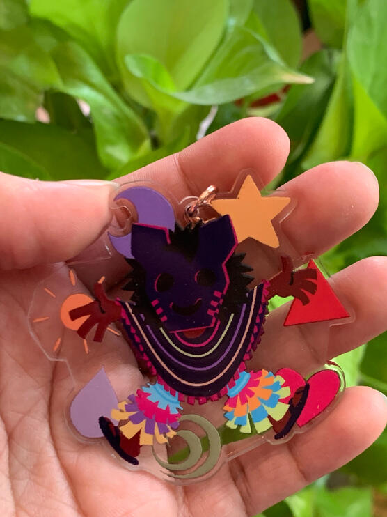 2.5" Clear Acrylic Keychain featuring Mask from Wandersong